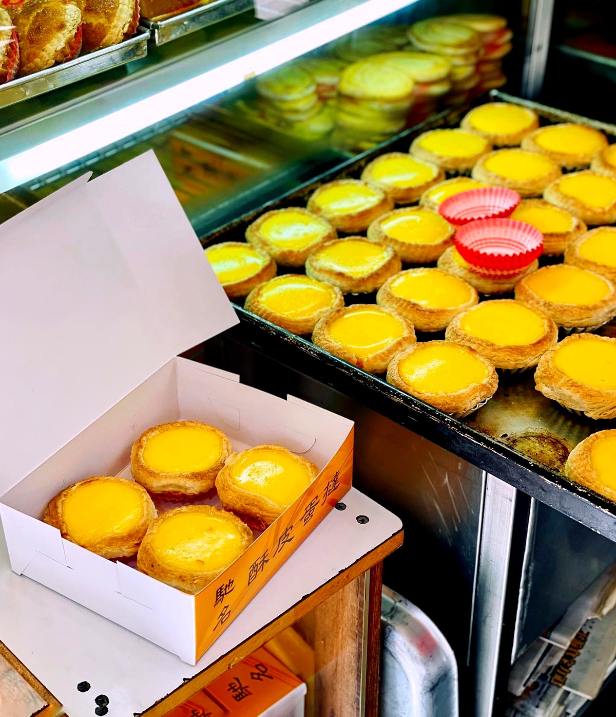 Fresh egg tarts at a Hong Kong bakery counter