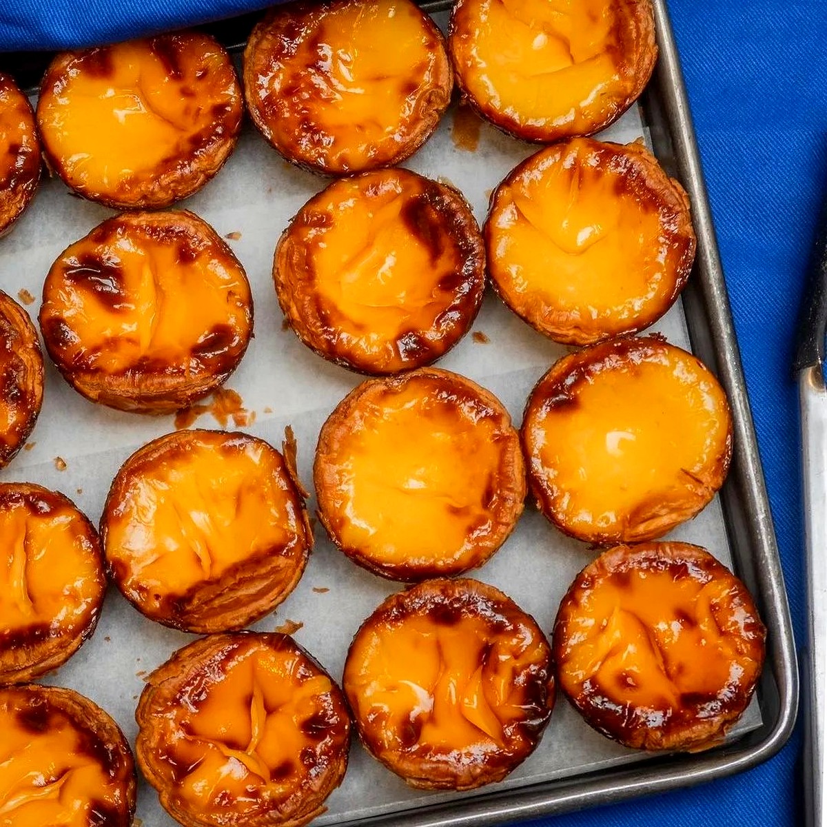 Fresh sourdough egg tarts at Bakehouse, straight off the tray