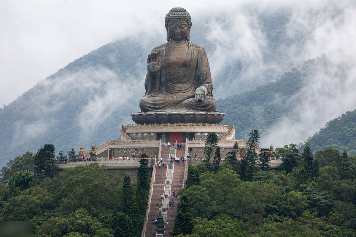 Tian Tan Big Buddha in misty mountains, Lantau