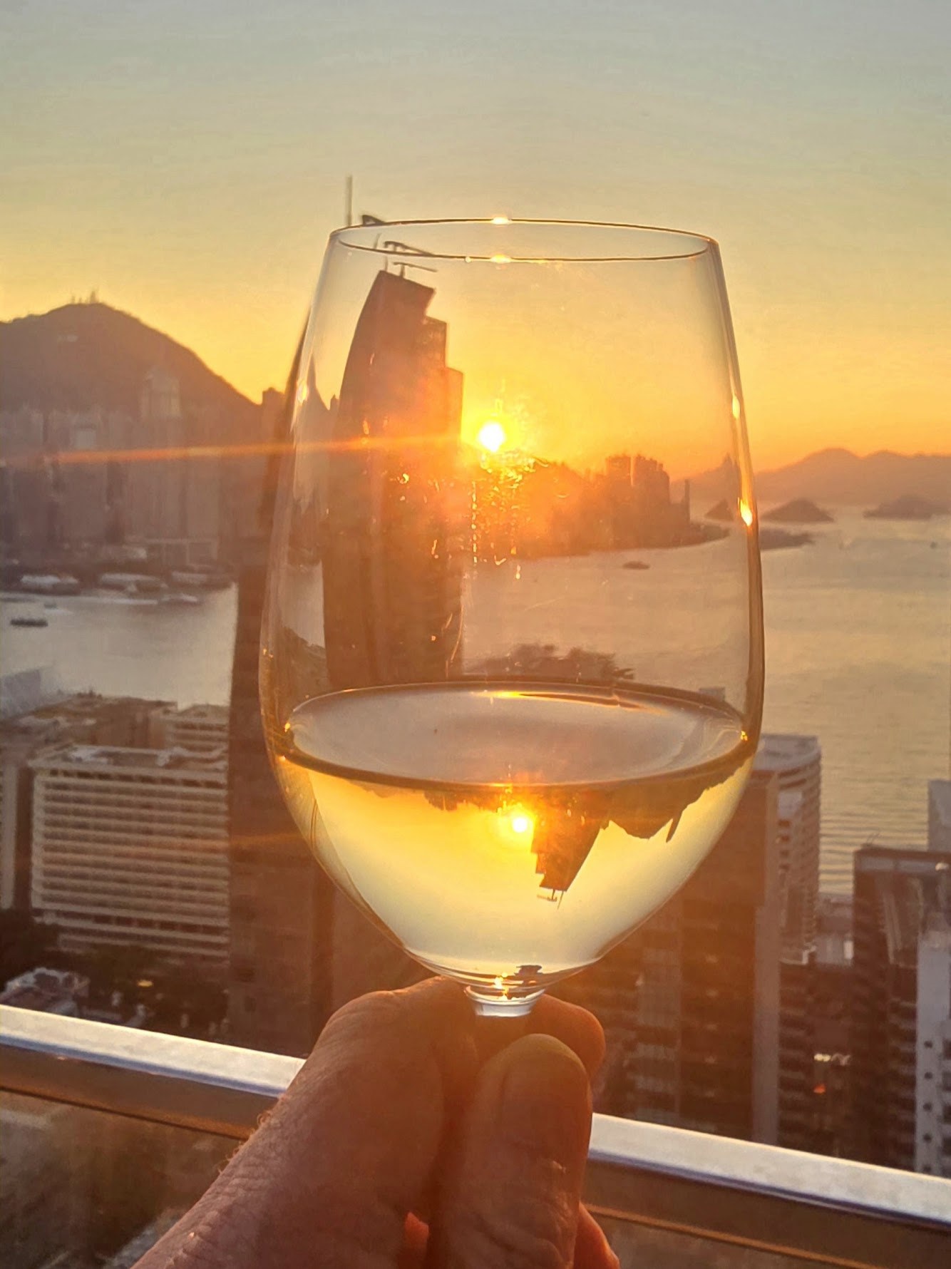 Hong Kong's best rooftop bars — sunset over the harbour