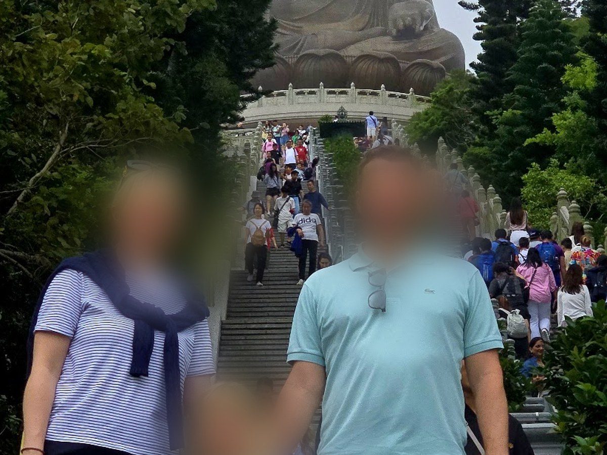Family at the Big Buddha on Lantau, guest faces blurred