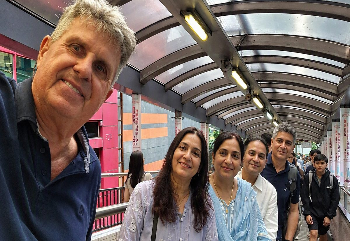 Hans with a family group on the Mid-Levels escalator