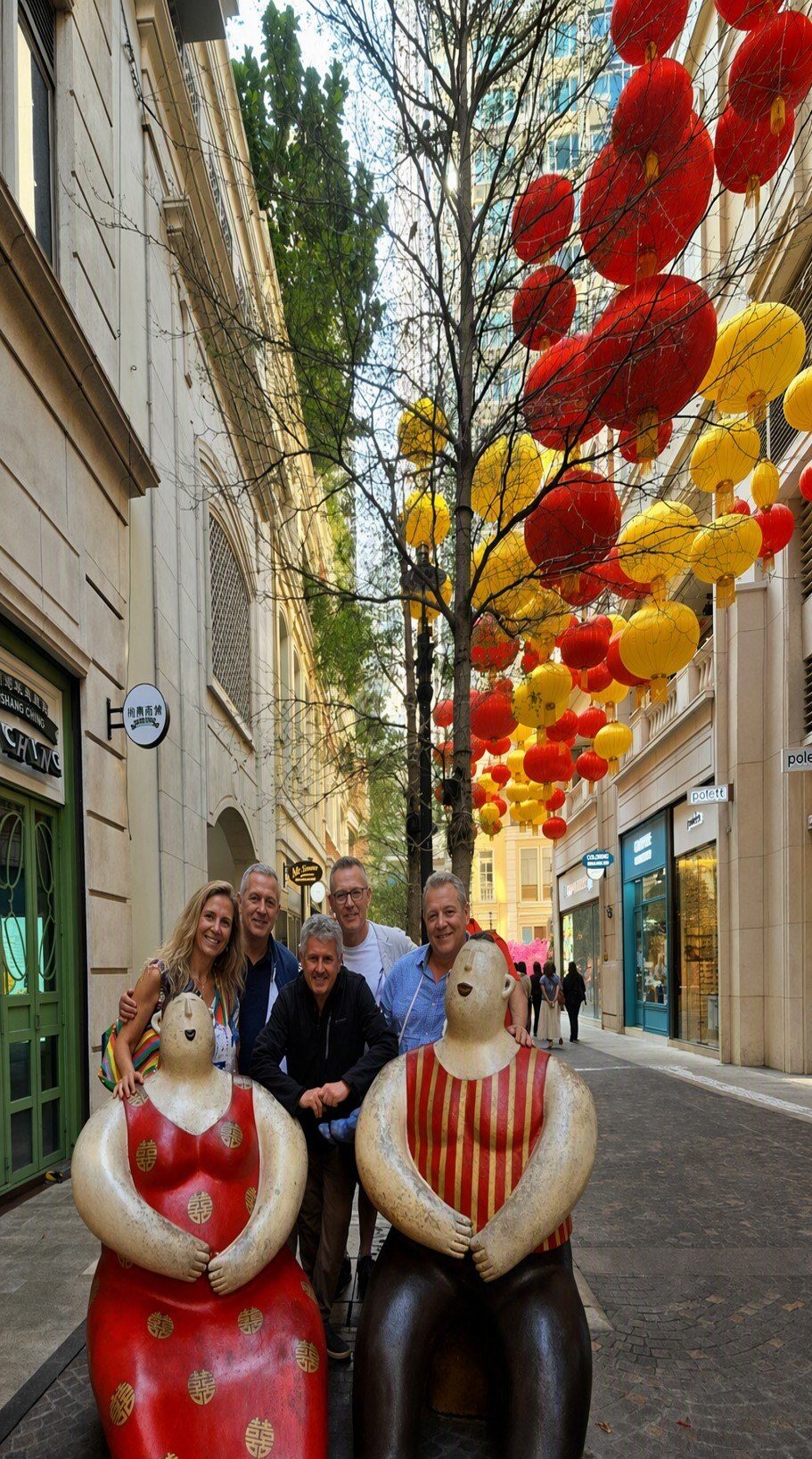 Hans with guests under the lanterns at Lee Tung Avenue