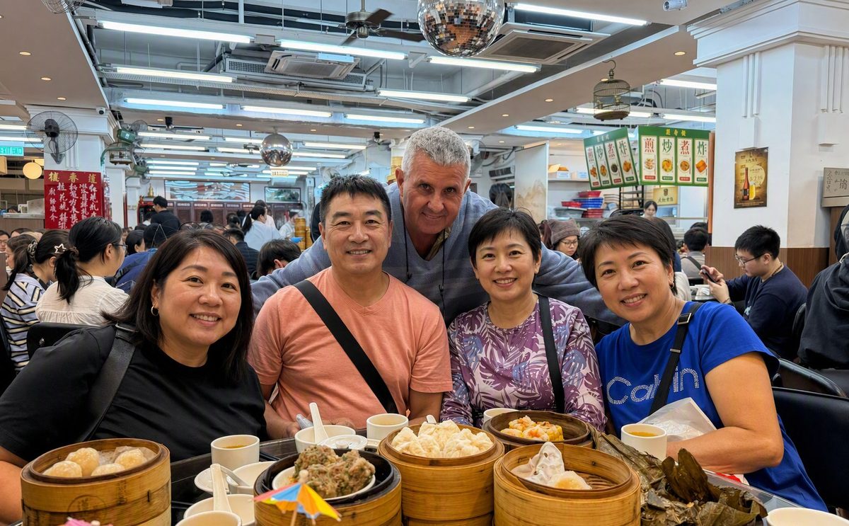 Hans with guests over a dim sum lunch
