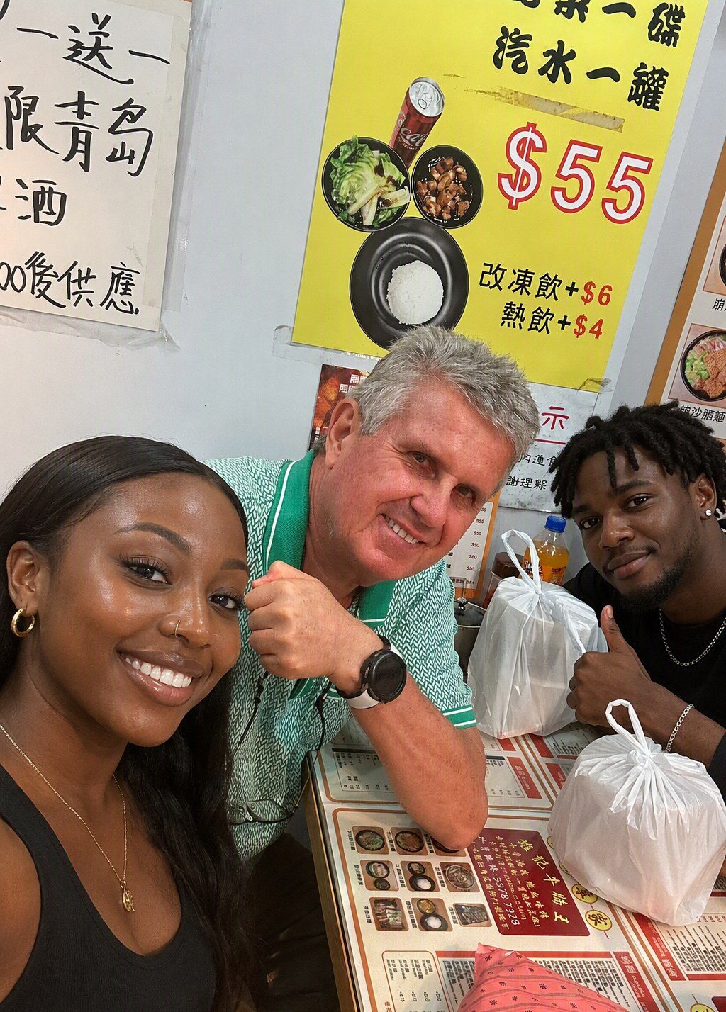 Hans with guests at a small local eatery
